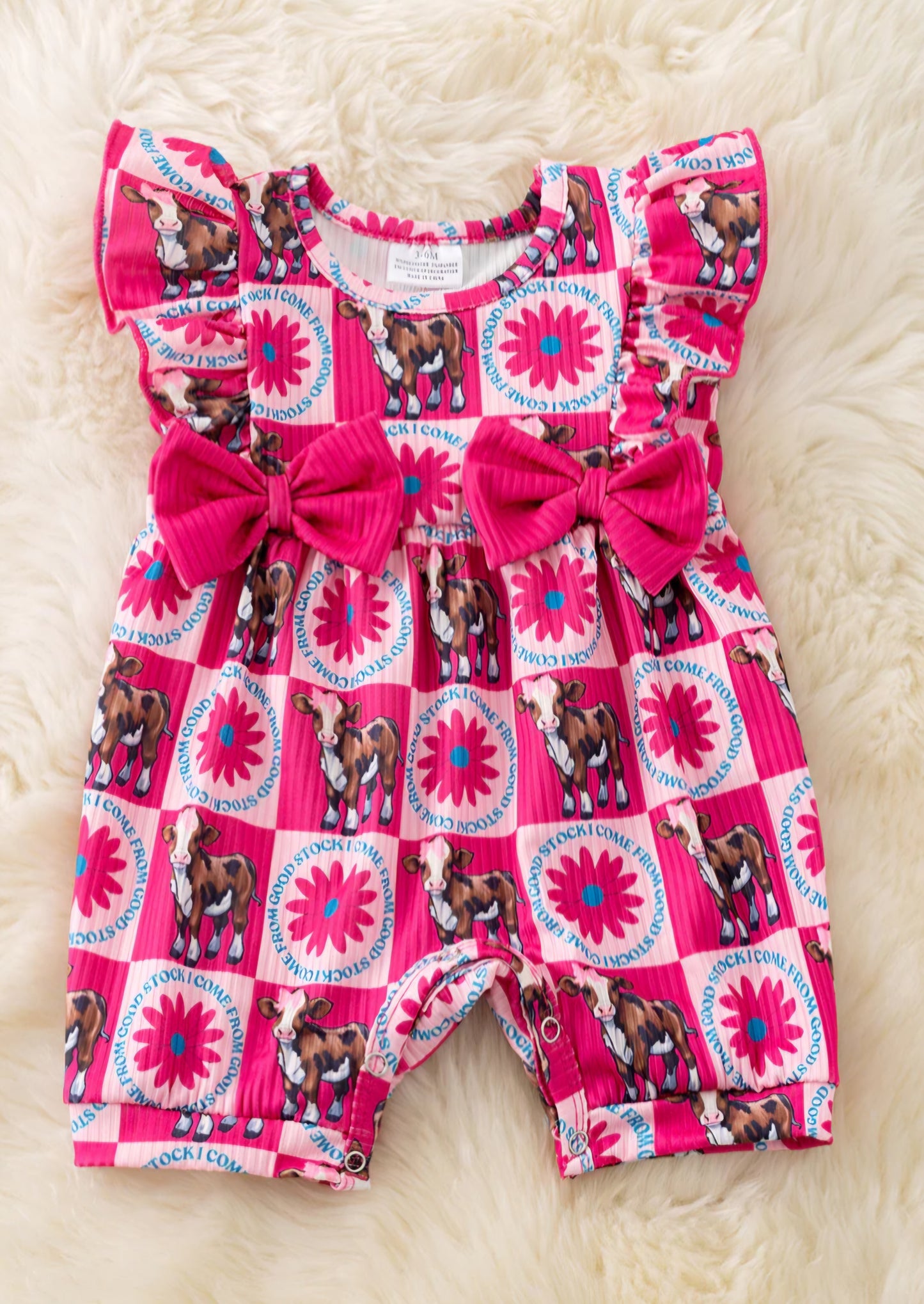 "I come from good stock" Cow printed baby romper w/side bows