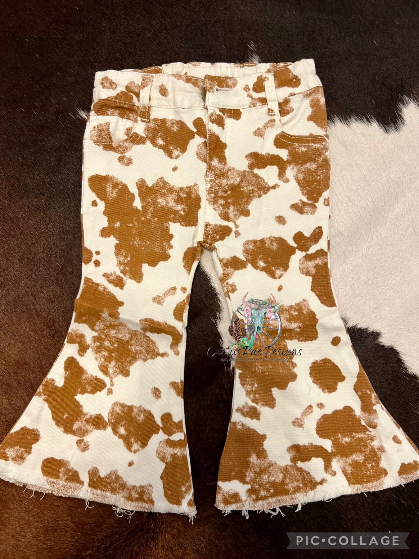 Cow Print Raw Edge Flair Jeans